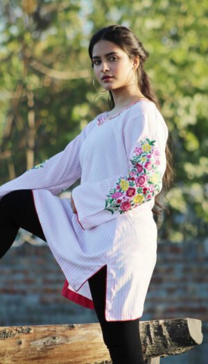 Rosewood Stripe Lawn Kurta, a stunning 1-piece pink and white striped lawn kurta with intricate machine embroidery on the neck and sleeves featuring vibrant pink, yellow, and green