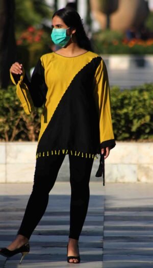 Gilded Ebony Fusion Western kurta, a stunning yellow and black linen piece featuring exquisite hand work and a modern diagonal cut.
