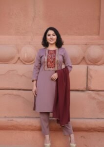 Mauve Blossom Gota Ensemble, a stunning 3-piece mauve lawn suit featuring a vibrant exquisite floral patch on the neck and border, paired with a matching lawn dupatta adorned with gota lace work.