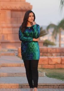 Glitz Horizon Sequence Shirt, a stunning high-shine top featuring hand-stitched sequences in a multi-tonal pattern, exclusively by Asmar Poshak.