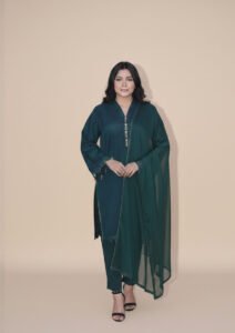 Emerald Tassel Sovereign Suit, a stunning 3-piece deep teal lawn ensemble featuring exquisite gold tassel work on the neckline, paired with a matching regal shaffon dupatta.