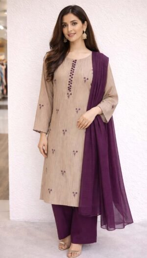 Crimson Filigree Embroidered Suite, a stunning 3-piece vibrant red lawn ensemble featuring exquisite machine embroidery in ivory and gold across the shirt, paired with a sheer radiant shafon dupatta.