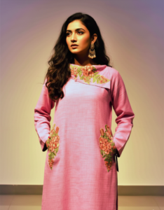 Emerald Tribal Fusion kurta, a stunning multi-patterned khadder piece featuring exquisite hand work, red botanical prints, and lime green geometric borders.