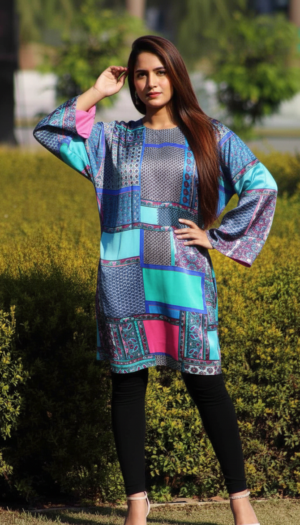 Radiant Mosaic Silk kurta, a stunning multi-colored silk piece featuring exquisite hand work, teal and magenta patchwork, and a modern Western high-neck silhouette.