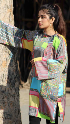 Kaleidoscope Silk Fusion kurta, featuring a stunning patchwork of teal, magenta, lime green, and geometric patterns on luxurious high-luster silk.