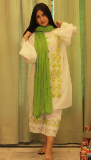 Neon Blossom Lawn Trio, a stunning 3-piece white lawn suit featuring exquisite lime green patch work on the shirt, intricate machine embroidery on the trousers, and matching lime accents